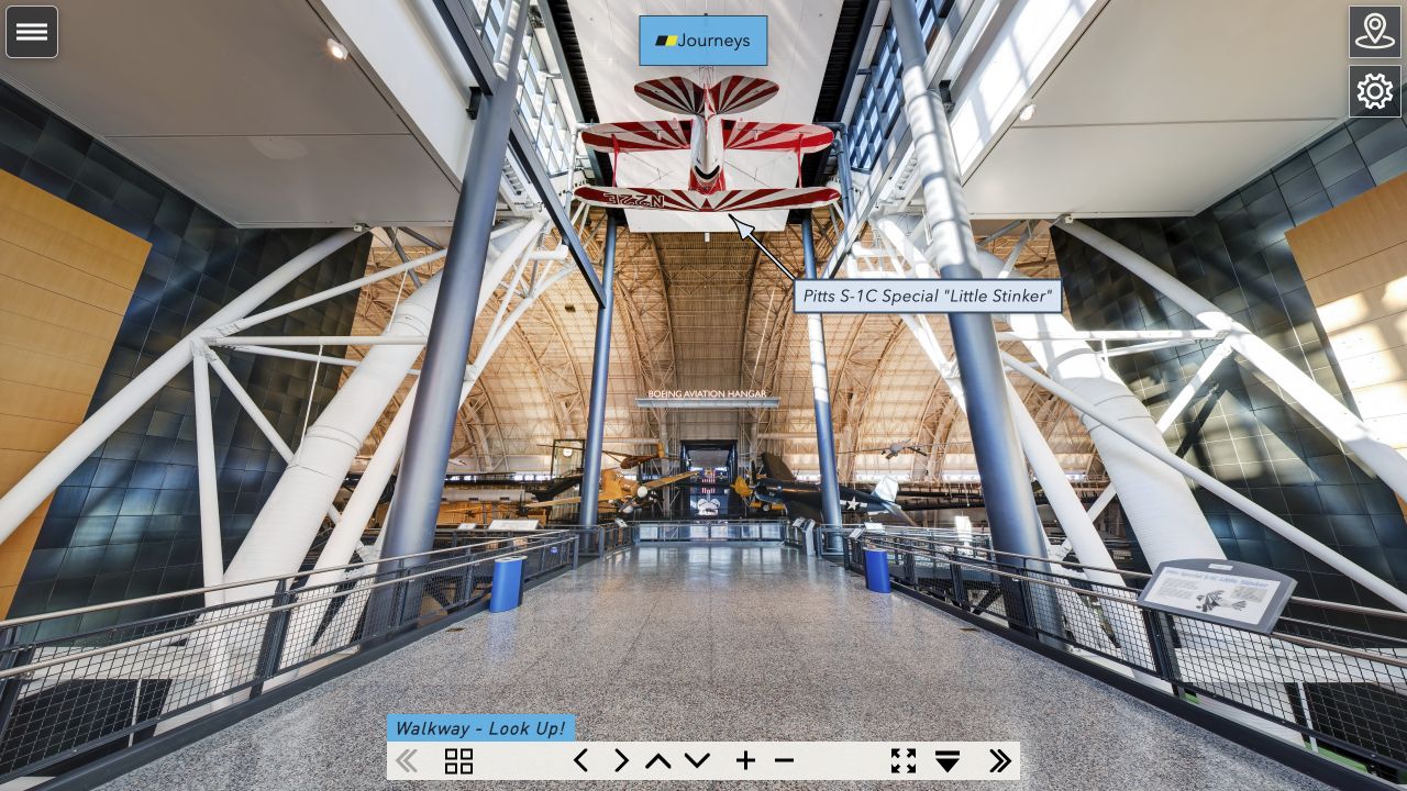 Full tour interface showing the panoramic scene, map and settings controls, and bottom navigation ribbon with learning-journey access.