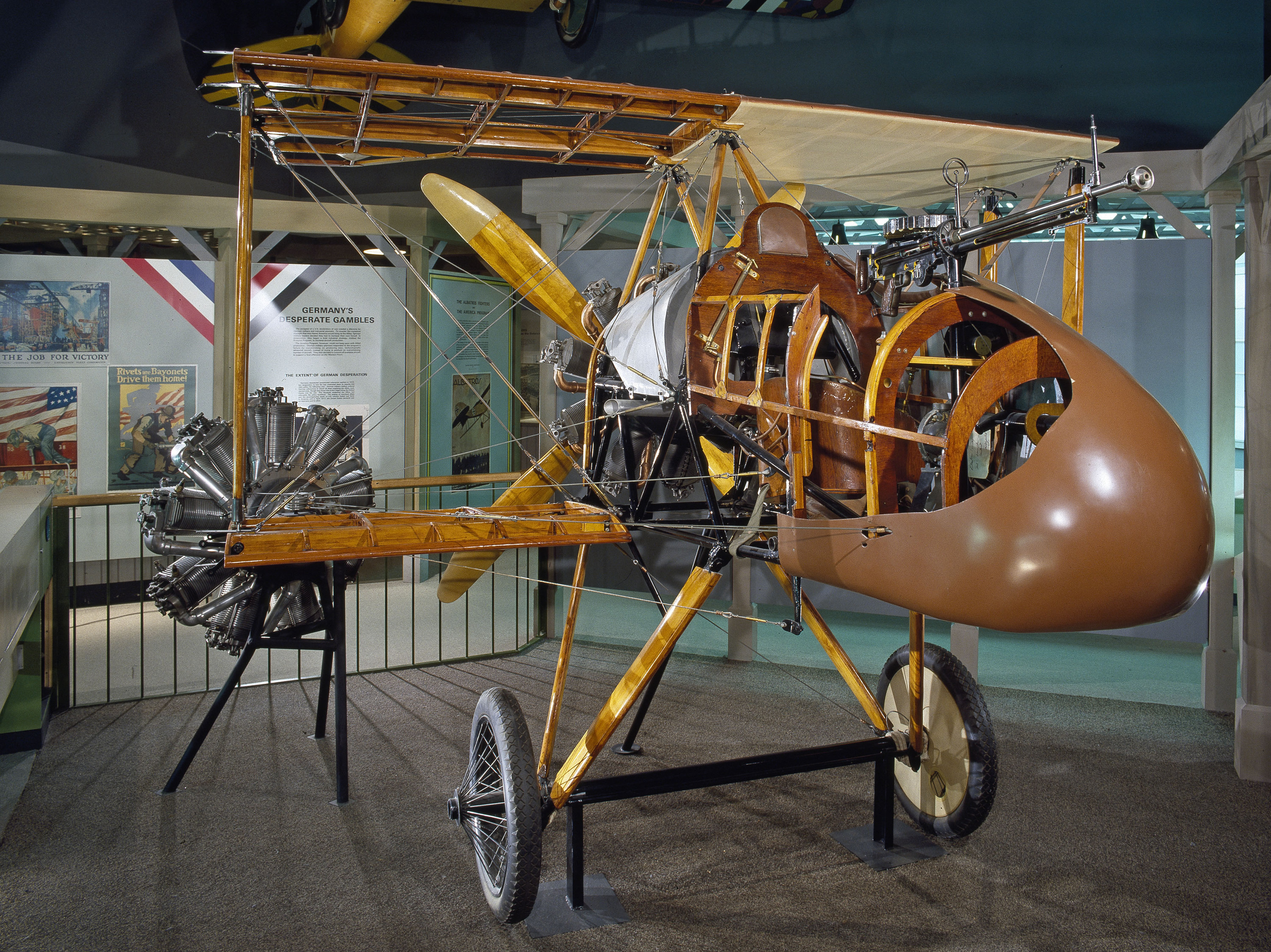 Orange F.E.8 fighter nacelle with open cockpit, short wings, and blue number 2.
