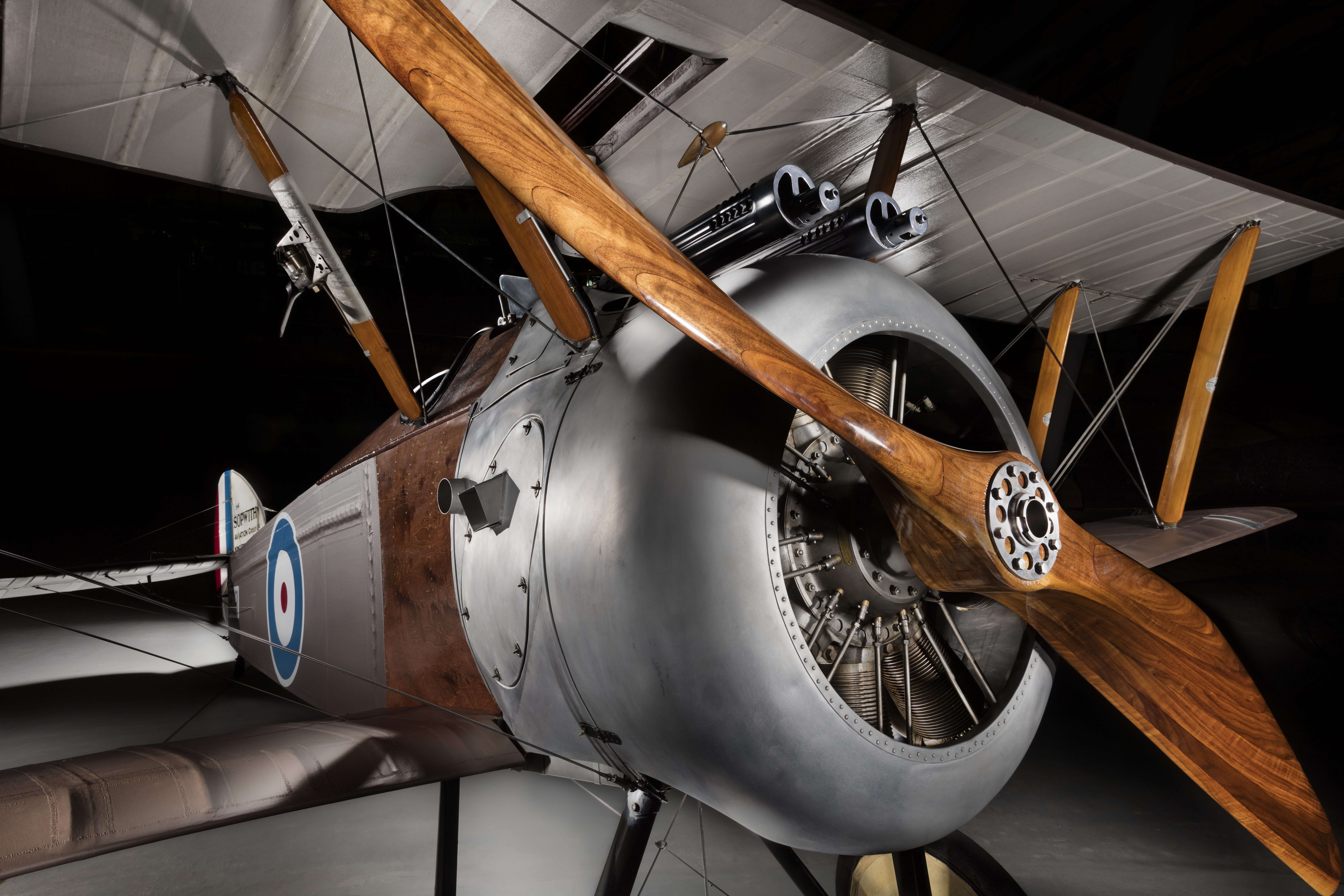 British single-seat Sopwith Camel biplane with twin guns above the engine cowling.
